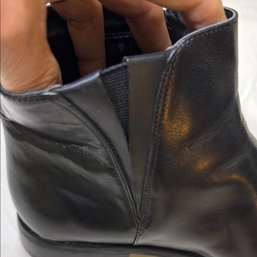 Michael Kors Black and Gold Ankle Booties with Streamlined Silhouette - Picture 10 of 11
